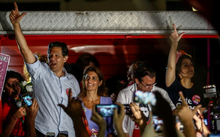 Although running for Brazilian president himself, Fernando Haddad never fails to demonstrate his loyalty to former president Luiz Inacio Lula da Silva with the "L" sign of support for the iconic Worklers' Party leader