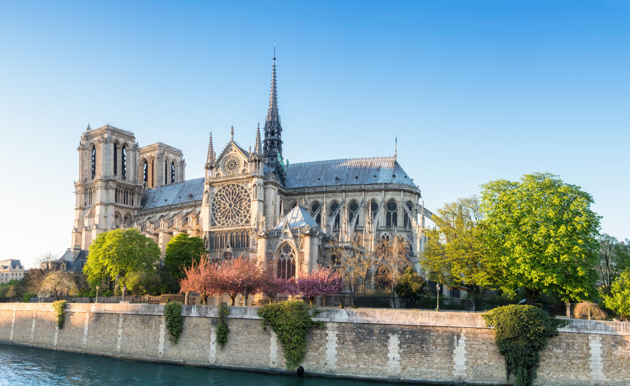 Notre Dame Cathedral in Paris on a bright afternoon in Spring, panorama image