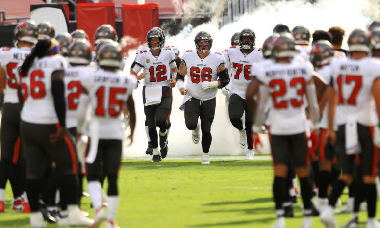 The Tampa Bay Buccaneers run onto the field.