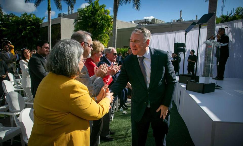 Miami, FL- January 31, 2023 - Ken Griffin, right, greets Miami-Dade County Mayor Daniella Levine Cava, left, on his way to the podium to speak to dignitaries and guests in Nicklaus Children’s Hospital Advanced Pediatric Care Pavilion Courtyard. Billionaire Citadel founder and CEO Ken Griffin donated $25 million to Nicklaus Children’s to support the new five-story, 127,000-square-foot surgical tower opening in 2024. The tower will be named the Kenneth C. Griffin Surgical Tower. Jose A. Iglesias/jiglesias@elnuevoherald.com