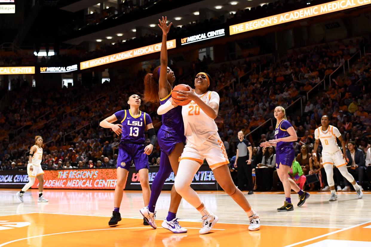 Tennessee's Tamari Key (20) tries to score while guarded by LSU's Angel Reese (10) during an NCAA college basketball game on Sunday, February 25, 2024 in Knoxville, Tenn.