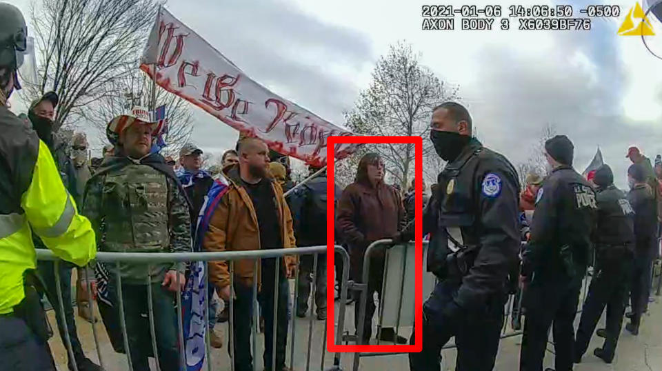 In this image from U.S. Capitol Police video, released and annotated by the Justice Department in the sentencing memorandum, Patrick McCaughey III,, appears on police body-worn camera footage at the U.S. Capitol on Jan. 6, 2021, in Washington. McCaughey who used a stolen riot shield to crush a police officer in a doorframe during the U.S. Capitol insurrection was sentenced on April 14, 2023, to more than seven years in prison for his role in one of the most violent episodes of the Jan. 6 attack.(Justice Department via AP)
