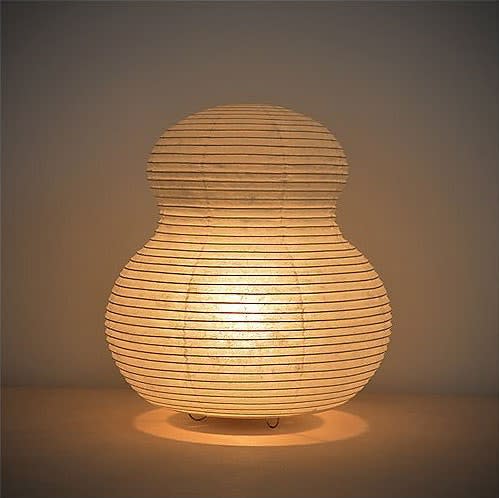$135, YLighting. <a href="https://www.ylighting.com/paper-moon-gourd-table-lamp-by-asano-SANY20434.html" rel="nofollow noopener" target="_blank" data-ylk="slk:Get it now!" class="link ">Get it now!</a>