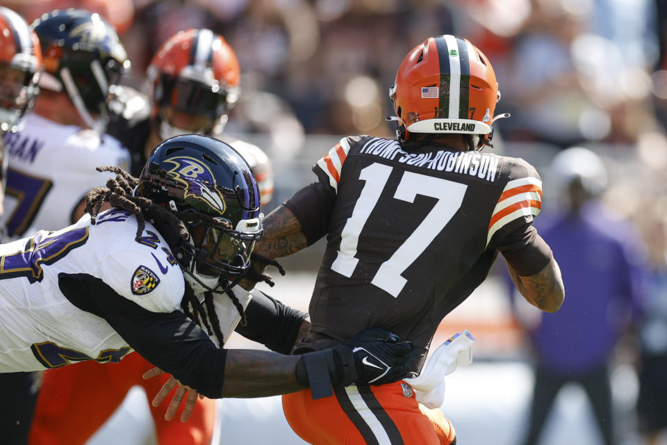 FILE - Baltimore Ravens linebacker Jadeveon Clowney pressures Cleveland Browns quarterback Dorian Thompson-Robinson (17) during the first half of an NFL football game, Oct. 1, 2022, in Cleveland. Watson was safe on the sideline the last time the Browns played the Ravens. He'll be in harm's way on Sunday, Nov. 12, 2023. (AP Photo/Ron Schwane, File)
