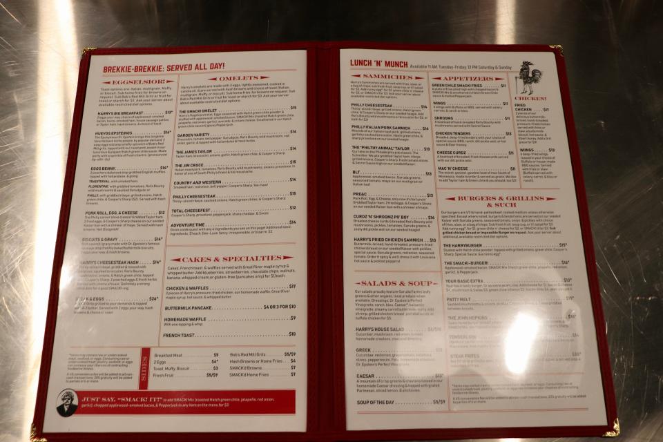 The full menu at Harry's Bar & Grill is seen on Monday, Aug. 21, 2023. The current menu features a number of similar flavor profiles, with cheesesteak featuring in dishes from breakfast to dinner. Once the restaurant holds its grand opening, the menu will continue to expand, owner Hart Epstein said.