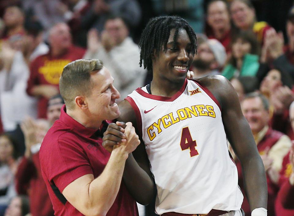 Iowa State men's basketball head coach T. J. Otzelberger congratulates Demarion Watson after his stellar performance in a win over Oklahoma on Wednesday.