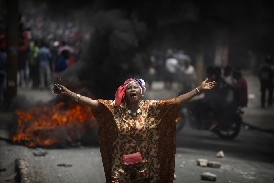 A protester yells anti-government slogans in Port-au-Prince, Haiti, June 9, 2019. Protesters denouncing corruption paralyzed much of the capital as they demanded the removal of President Jovenel Moise. The image was part of a series of photographs by Associated Press photographers which was named a finalist for the 2020 Pulitzer Prize for Breaking News Photography. (AP Photo/Dieu Nalio Chery)