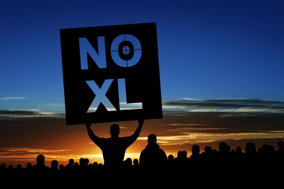 XXXL keystone pipeline protestors: iStock by Getty Images/sharply_done