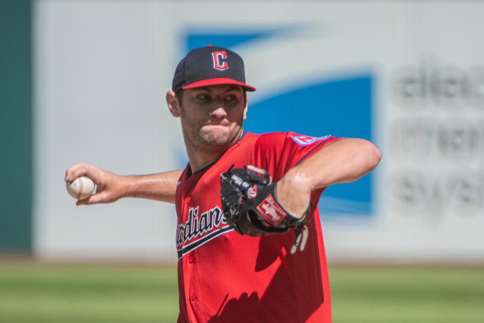 Cleveland Guardians starting pitcher Gavin Williams delivers against the Texas Rangers during the first inning of a baseball game in Cleveland, Sunday, Sept. 17, 2023. (AP Photo/Phil Long)