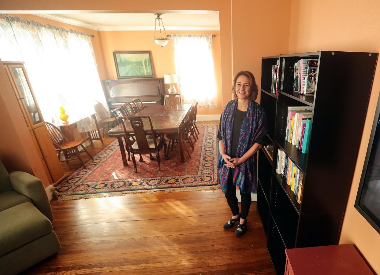Poulsbo housing, health and human services director Kim Hendrickson inside the living room of the Nelson Park Farmhouse in Poulsbo on Friday, Feb. 16, 2024.