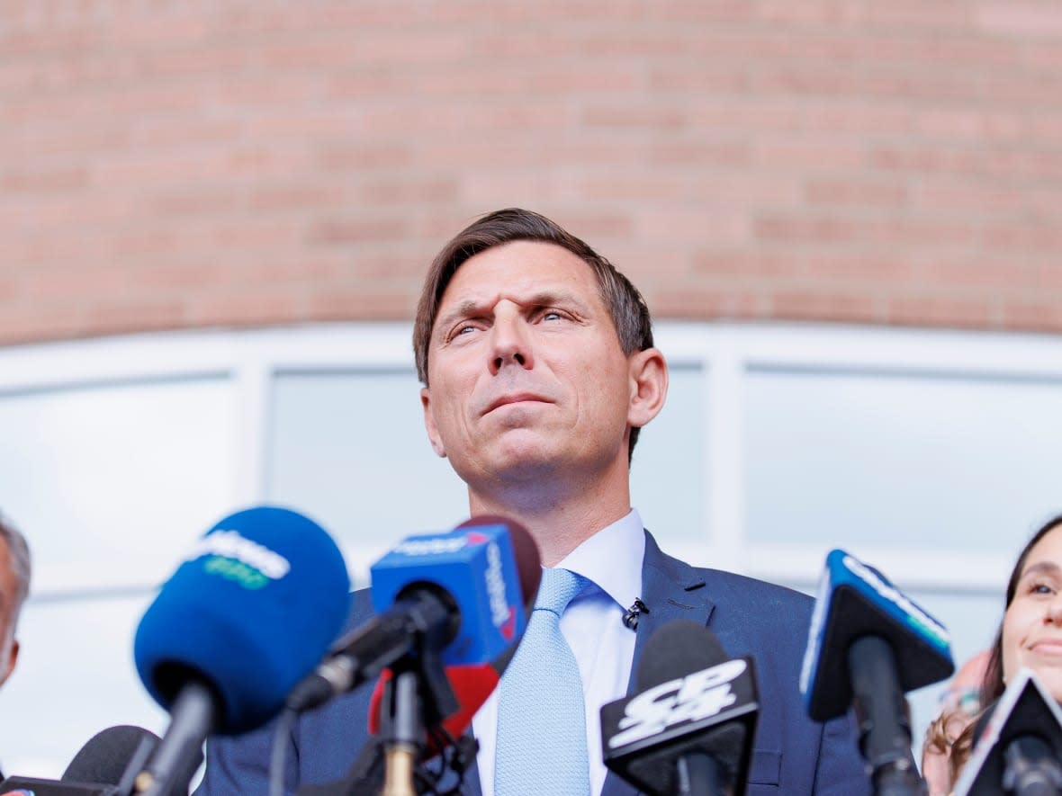 Patrick Brown holds a press conference on the steps of Brampton City Hall announcing his intention to run, again, for mayor on July 18, 2022. (Evan Mitsui/CBC - image credit)