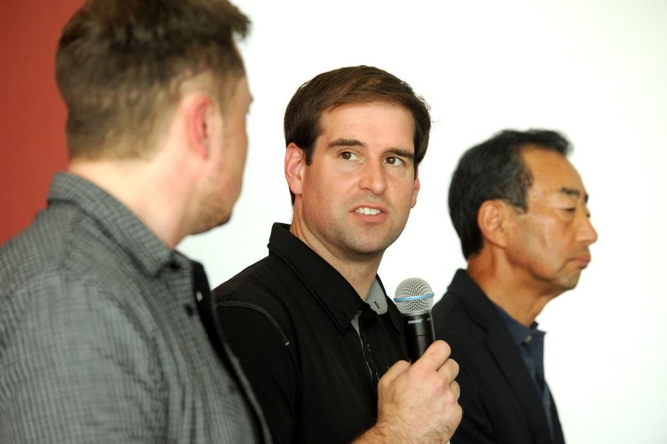 Tesla CTO JB Straubel (center) has been instrumental in driving the company’s success. Source: REUTERS/James Glover II