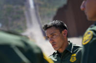 Border Patrol Deputy Chief for the Tucson Sector Justin De La Torre speaks along the border fence of the U.S.-Mexico border, Tuesday, Aug. 29, 2023, in Organ Pipe Cactus National Monument near Lukeville, Ariz. U.S. Customs and Border Protection reports that the Tucson Sector is the busiest area of the border since 2008 due to smugglers abruptly steering migrants from Africa, Asia and other places through some of the Arizona borderlands' most desolate and dangerous areas. (AP Photo/Matt York)