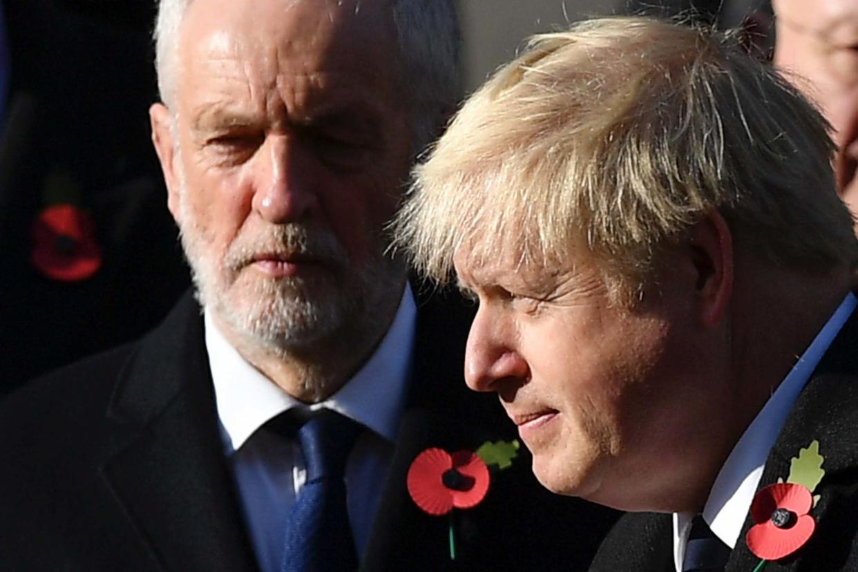 Broken system: Jeremy Corbyn and Boris Johnson at the Cenotaph yesterday: AFP via Getty Images