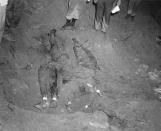 <p>FBI photo shows the bodies of Schwerner, Chaney and Goodman being recovered from an earthen dam just southwest of Philadelphia, Mississippi. This FBI photograph, entered as evidence by the prosecution in the Edgar Ray Killen trial, shows the bodies of Michael Schwerner, James Chaney and Andrew Goodman being recovered from an earthen dam just southwest of Philadelphia, Mississippi on August 4, 1964. Accused Ku Klux Klansman Killen was implicated in the killing of a civil rights worker in testimony from a now-deceased Klansman read in court on June 17, 2005. (Photo: Handout/Reuters) </p>