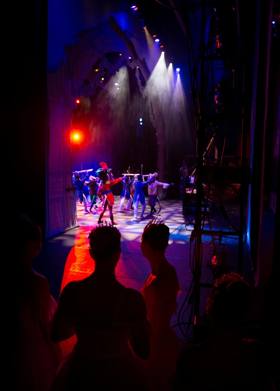 Dancers with The Eugene Ballet company wait in the wings for their cue to take the stage during a Thursday rehearsal of "The Nutcracker" at the Hult Center.