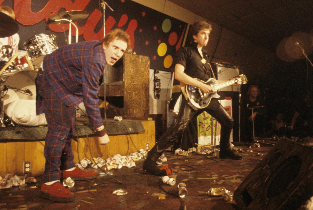 UNITED STATES - JANUARY 08: TEXAS The Sex Pistols performing live onstage at Randy's Rodeo Nightclub, San Antonio, during final tour on January 08 1978 L-R Johnny Rotten (John Lydon) Steve Jones (Photo by Richard E. Aaron/Redferns)