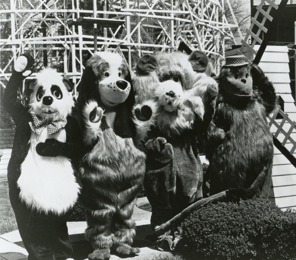 Geauga Lake's "Fun Bunch" (from left) Penny Panda, Geauga Dog, Dandy Lion and Gunky Monkey greet visitors on the midway. (Beacon Journal file photo)