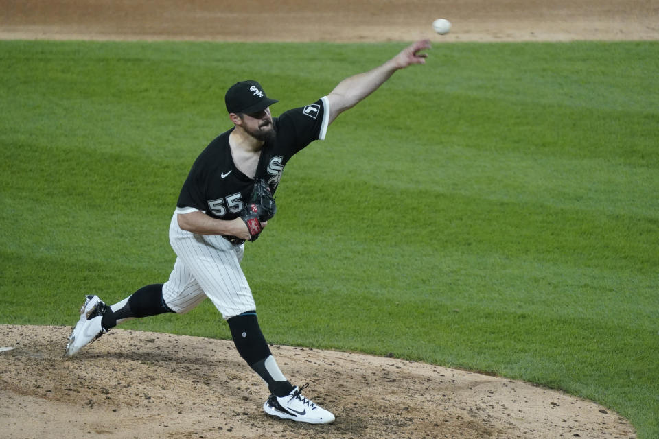 Chicago White Sox starting pitcher Carlos Rodon (55) throws against the Cleveland Indians during the fourth inning of a baseball game, Wednesday, April, 14, 2021, in Chicago. (AP Photo/David Banks)