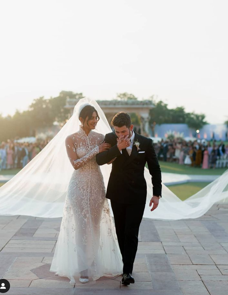 <p>Priyanka Chopra and Nick Jonas tied the knot with multiple breath-taking ceremonies held in Mumbai, India and Jodhpur, India. For the Christian ceremony, Priyanka wore this custom Ralph Lauren wedding dress paired with a 75-foot long veil. Chopra also donned designs by Sabyasachi, Dior, and more for the couple's various other celebrations.</p>