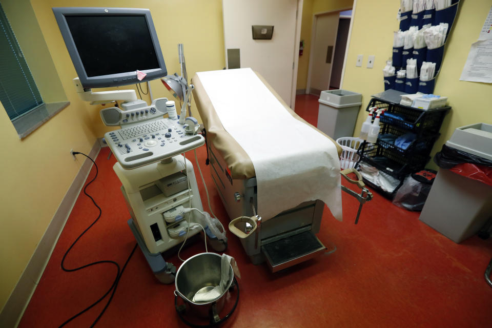 FILE - This Friday, May 17, 2019 file photo shows an examination/procedure room at the Jackson Women's Health Organization in Jackson, Miss. The facility is the state's only abortion clinic. Technology and science have given women unprecedented options and control over fertility since 1973. Back then, single women had only recently gained nationwide access to birth control, thanks to a 1972 Supreme Court ruling, said Dr. Sarah Prager, who directs the University of Washington School of Medicine's family planning fellowship. (AP Photo/Rogelio V. Solis)