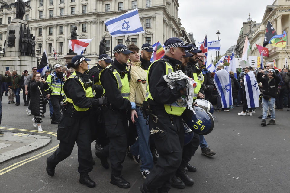 Police arrest a Pro-Palestinian protester during a demonstration in London, Saturday, April 27, 2024.