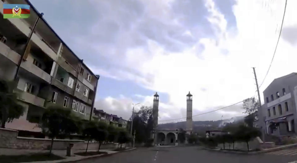 This photo taken from a video released by Azerbaijan's Defense Ministry on Monday, Nov. 9, 2020, shows a view of Yukhari Govhar Agha Mosque in Shushi, in the separatist region of Nagorno-Karabakh. President Ilham Aliyev said Sunday that Azerbaijani forces had taken control of the strategically important city in Nagorno-Karabakh, where fighting with Armenia has raged for over a month. (Azerbaijan's Defense Ministry via AP)