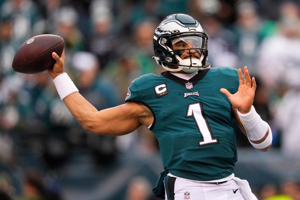 Philadelphia Eagles quarterback Jalen Hurts warms up before the NFC Championship NFL football game between the Philadelphia Eagles and the San Francisco 49ers on Sunday, Jan. 29, 2023, in Philadelphia.