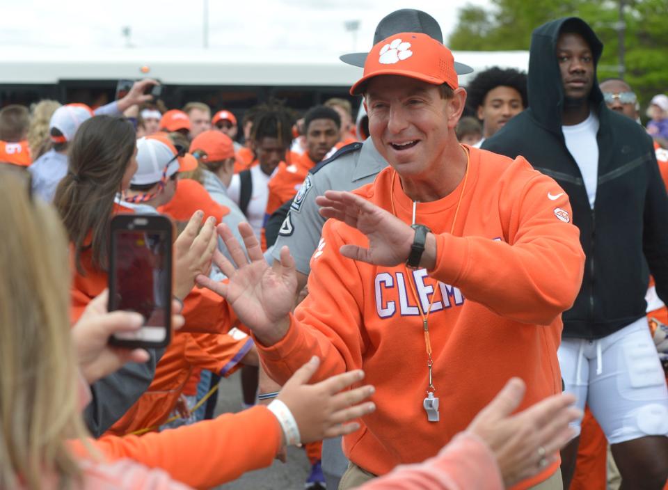 Clemson head coach Dabo Swinney enters the Tiger Walk before the 2022 Orange vs White Spring Game at Memorial Stadium in Clemson, South Carolina Saturday, April 9, 2022.