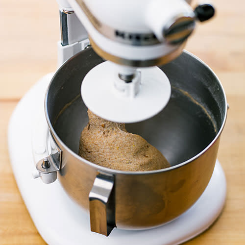 <div class="caption-credit"> Photo by: Thomas J. Story</div><b>Knead the dough <br> If using a mixer:</b> Beat on medium speed, scraping down inside of bowl occasionally, until dough is smooth, soft, and stretchy (it should still feel tacky), 12 to 15 minutes. <br> <br> <b>If kneading by hand:</b> Transfer to a slightly floured work surface and knead with damp hands, adding only a light coating of flour and wetting hands as required to prevent sticking, until dough is smooth, soft, and stretchy (it should still feel tacky), 12 to 15 minutes. <br> <br> More: <a rel="nofollow noopener" href="http://www.sunset.com/food-wine/healthy/healthy-snacks-00418000075640?XID=yshi-bake-bread" target="_blank" data-ylk="slk:20 healthy snacks;elm:context_link;itc:0;sec:content-canvas" class="link ">20 healthy snacks</a>