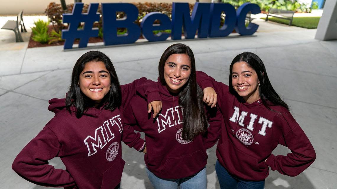 From left: Romina Cano Velasquez, 24, Fabiana Gonzalez Zambrano, 20, and Ana Camba Gomes, 20, enjoy their last moments together at the Miami Dade College West Campus on Friday, Aug. 19, 2022, in Doral, Fla. The three MDC Honors College graduates have been accepted into the Massachusetts Institute of Technology, where they will begin this fall. They are among only 21 transfer students that MIT accepted worldwide.