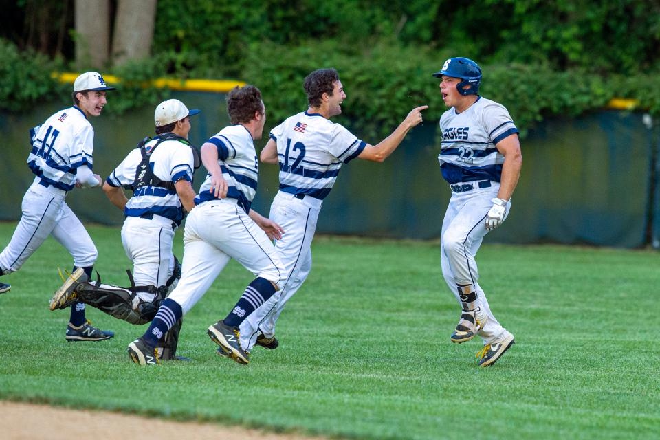 Middletown South's Joe Stanzione (right), shown celebrating with his teammates after he had the game-winning single in the bottom of the seventh of the Eagles' win over Clearview last year in a NJSIAA Group 4 semifinal, is one the candidates for Asbury Park Press Shore Conference Baseball Player of the Week.
