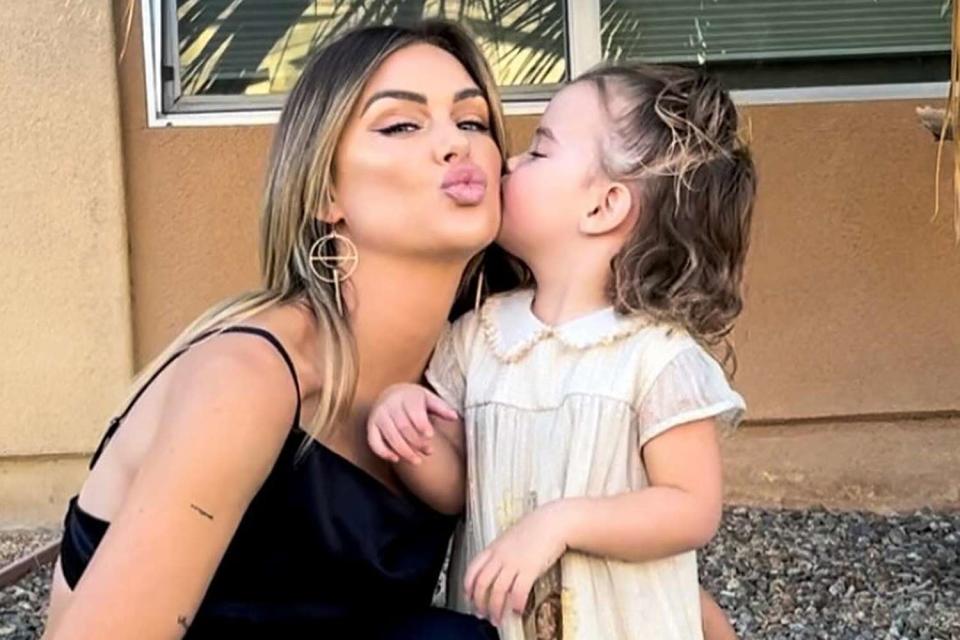 <p>Lala Kent/Instagram</p> Lala Kent gets a kiss from daughter Ocean, 3