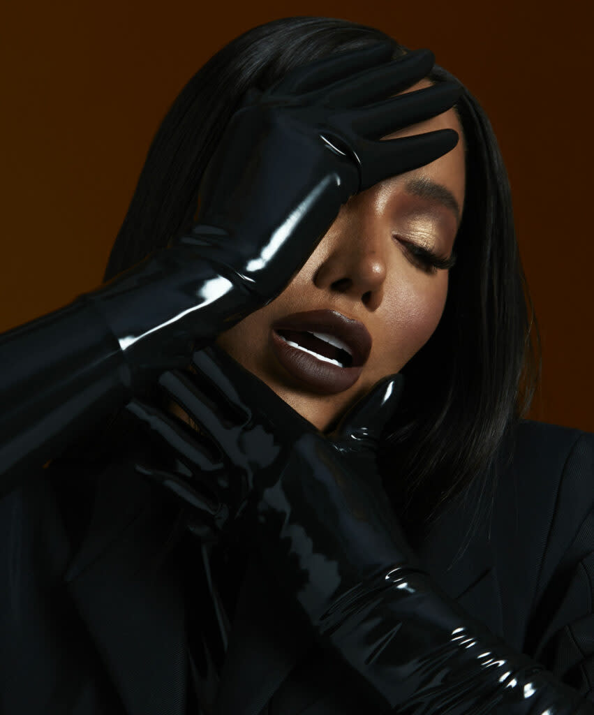 Munroe wears catsuit by Atsuko Kudo, Blazer by Mugler, photography by Jordan Rossi. Styling by Thomas George Wulbern.