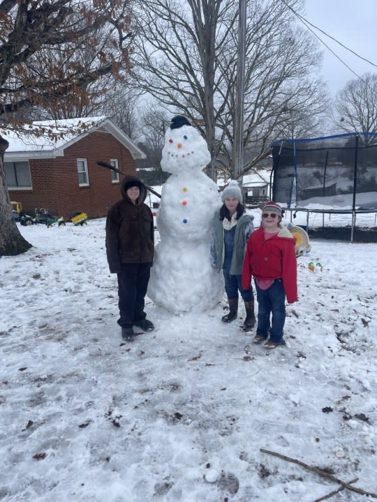 Alena, Charley, and Raelynn showed off their super-sized snow friend in Linden (Courtesy: Linette McKinley)