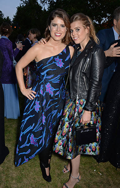 Princess Eugenie and Princess Beatrice standing side by side