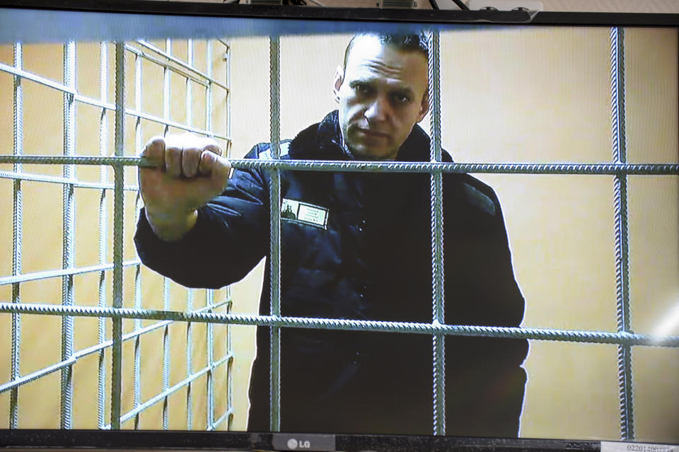 Navalny looks at a camera while speaking from a prison via a video link, Jan. 17, 2022. (Denis Kaminev/AP)