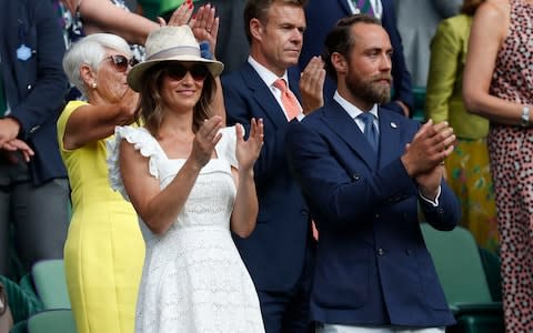 Pippa with her brother James Middleton in the Royal Box at Wimbledon in July 2018 - Credit: Heathcliff O'Malley/TMG