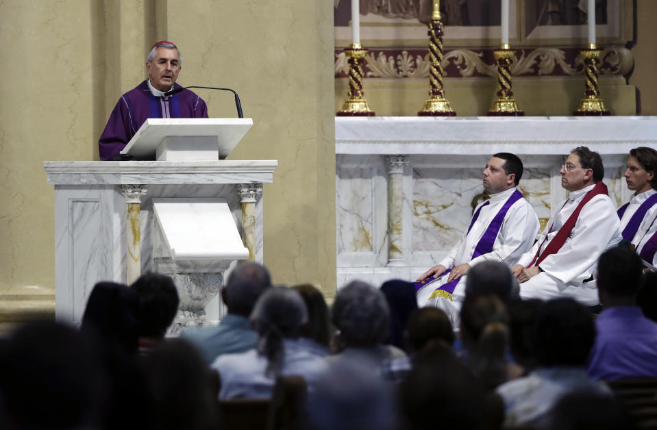 Bishop Ronald Gainer, of the Harrisburg Diocese, celebrates mass at the Cathedral Church of Saint Patrick in Harrisburg, Pa., Friday, Aug. 17, 2018. The grand jury report released this week found rampant sexual abuse of more than 1,000 children by about 300 priests in six Pennsylvania dioceses over seven decades. It criticized Gainer for advocating to the Vatican that two abusive priests not be defrocked. (AP Photo/Matt Rourke)