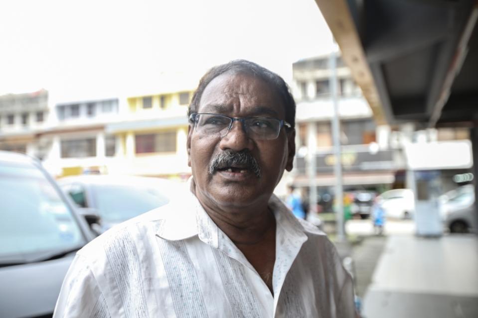 Renganathan, 71,  said air conditioners have become a necessity in this hot weather. — Picture by Ahmad Zamzahuri