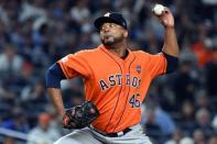 Oct 18, 2017; Bronx, NY, USA; Houston Astros relief pitcher Francisco Liriano (46) pitches during the eighth inning against the New York Yankees in game five of the 2017 ALCS playoff baseball series at Yankee Stadium. Mandatory Credit: Robert Deutsch-USA TODAY Sports