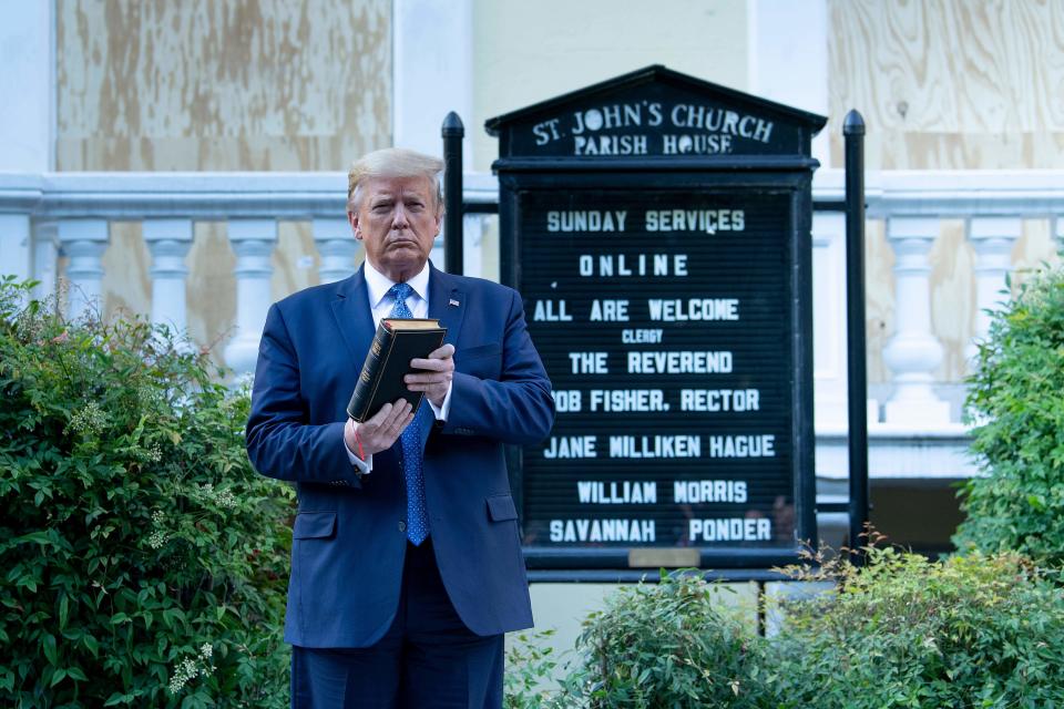 President Donald Trump holds a Bible while visiting St. John's Church across from the White House on June 1, 2020.