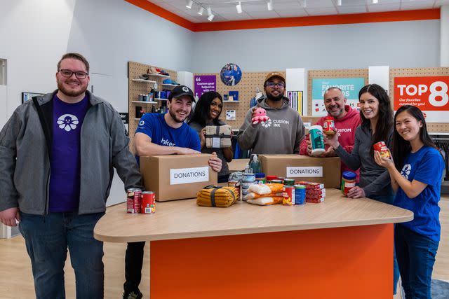 <p>Custom Inc</p> Inkers sort donations during a 203 Martin Luther King Jr. Day of Service.