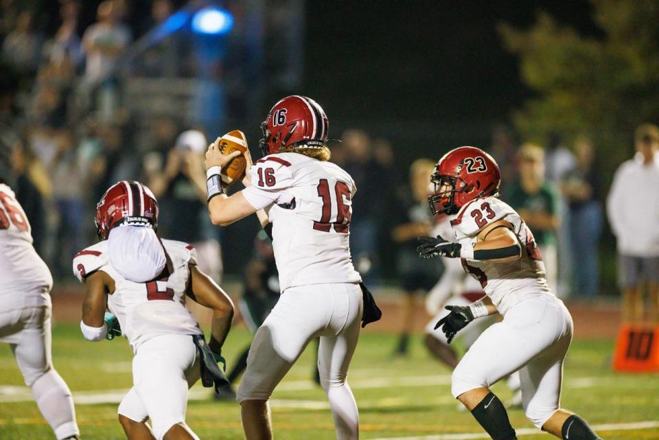 Whitman's Will Stafford (No. 23) scored two touchdowns in his debut for the Dean College football team.