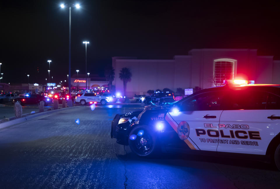 Police cars block the vehicles access to a shopping mall, Wednesday, Feb. 15, 2023, in El Paso, Texas. Police say one person was killed and three other people were wounded in a shooting at Cielo Vista Mall. One person has been taken into custody, El Paso police spokesperson Sgt. Robert Gomez said. (AP Photo/Andrés Leighton)