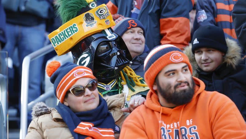 Fans watch the first half of an NFL football game between the Chicago Bears and Green Bay Packers, Sunday, Dec. 4, 2022, in Chicago.