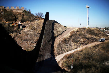 FILE PHOTO: A U.S. border patrol agent patrols the U.S. border with Mexico in Nogales, Arizona, U.S., January 31, 2017. REUTERS/Lucy Nicholson/File Photo