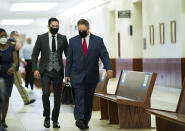 Victor Hugo Cuevas, a 26-year-old linked to a missing tiger named India, arrives at the Fort Bend County Justice Center for a bond revocation hearing on a separate murder charge, on Friday, May 14, 2021, in Richmond, Texas. Prosecutors in Fort Bend County are seeking to revoke a bond for Victor Hugo Cuevas after he was charged with murder in a 2017 fatal shooting. (Godofredo A. Vásquez/Houston Chronicle via AP)