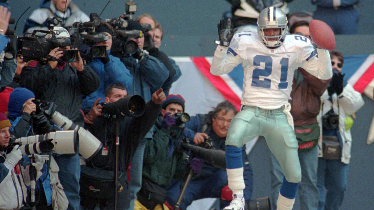 Mandatory Credit: Photo by Eric Gay/AP/Shutterstock (6512289a)SANDERS Dallas Cowboys' Deion Sanders dancing in the endzone following his second quarter touchdown against the Philadelphia Eagles, in the NFC Divisional playoffs, in Irving, Texas.