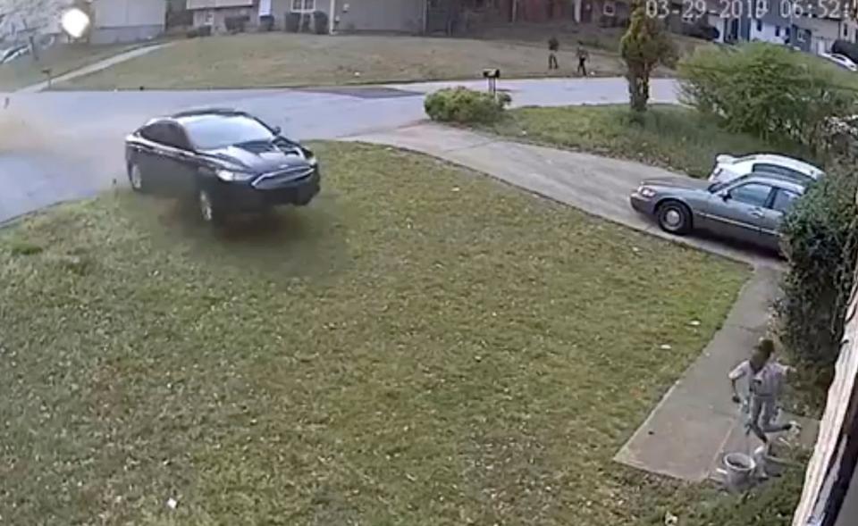 In this video frame grab made available by attorney Chris Stewart, shows a speeding car out of control before it hits LaDerihanna Holmes, 9, as she plays in her front yard Friday, March 29, 2019 in Lithonia, Ga.